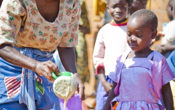 Volunteer serving Mary's Meals