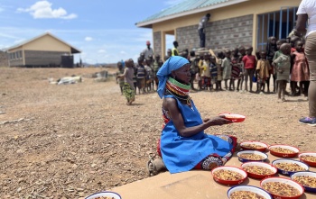 Feeding children in Kenya