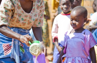 Volunteer serving Mary's Meals