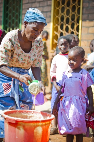 Volunteer serving Mary's Meals